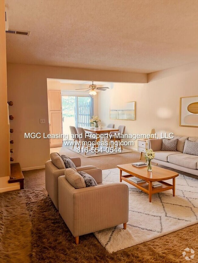 Building Photo - WHISPERING WINDS TOWNHOME READY FOR YOUR M...