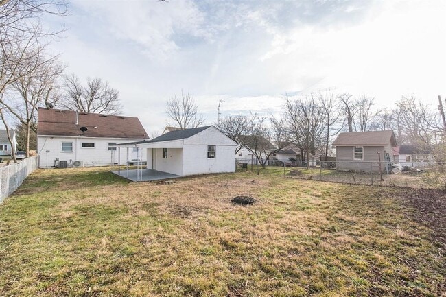 Photo - Spacious 4-Bedroom, 2-Bath Home with Garag...