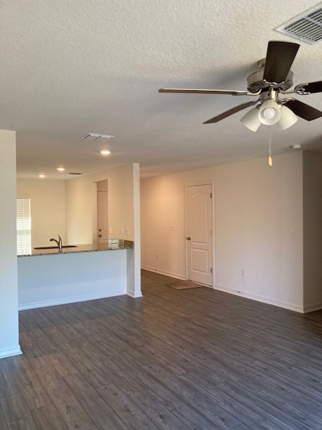 Photo - Like New 3/2/2 house with a screened in porch.