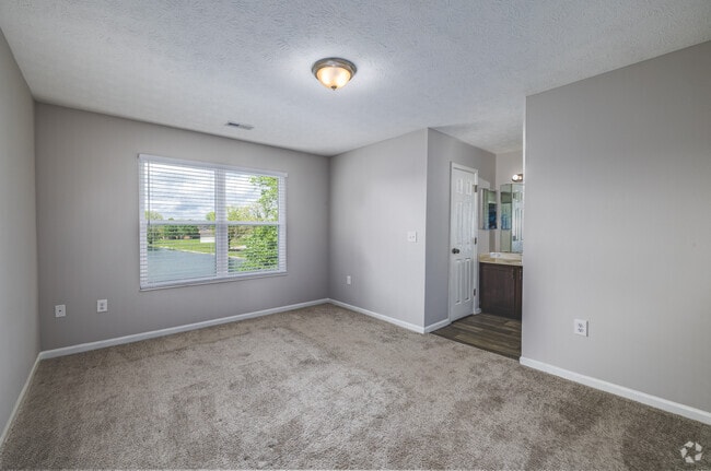 3BR, 2BA - 1,232SF - Primary Bedroom