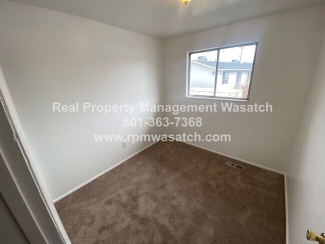 Photo - Check Out This Charming 3 Bedroom 1.5 Bathroom Condo in Midvale Ut!