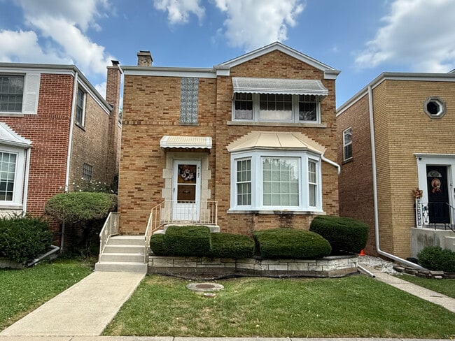 Building Photo - 6147 N Meade Ave Unit 2
