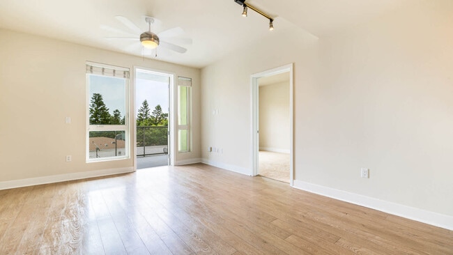 Living Room with Balcony and Hard Surface Flooring