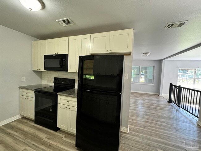 Photo - 6130 Syrcle Ave