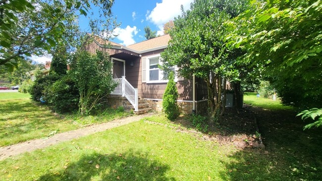 front door and right side - 116 Faw Rowland St