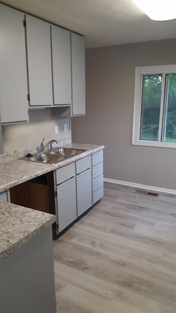 Photo - Charming 3 Bedroom Single-Family Home with Private Yard