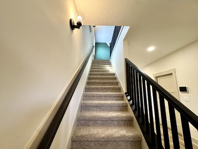 Photo - Need Space? How about 5 bedrooms, 2.5 baths + an extra bonus area upstairs so that the kids can ...