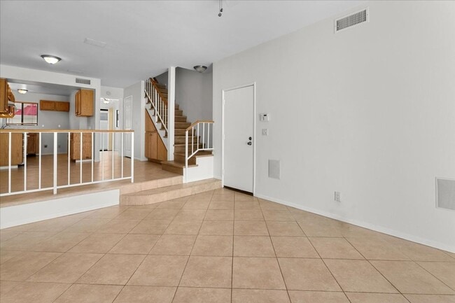 Photo - Light Filled Townhome Style Condo with Private Patios and Direct Access