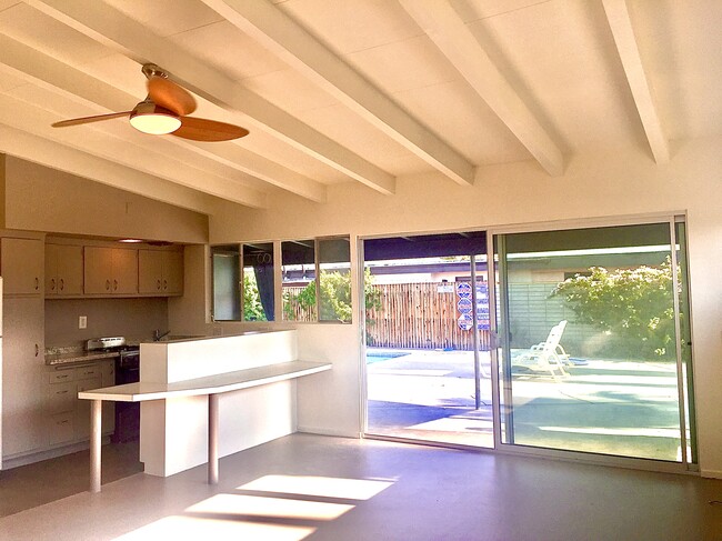 Vaulted ceilings with open floor plan and views over the pool. - 3715 E Calle de Ricardo Apartments Unit 3