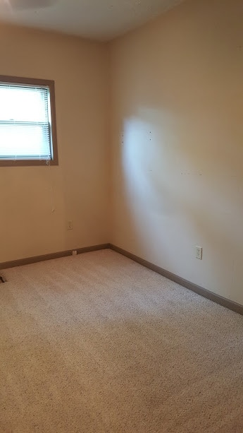 bedroom on first floor - 116 W Cypress St