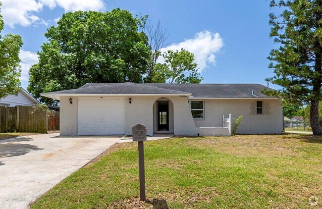 Building Photo - 8923 Tropical Palm Way Rental