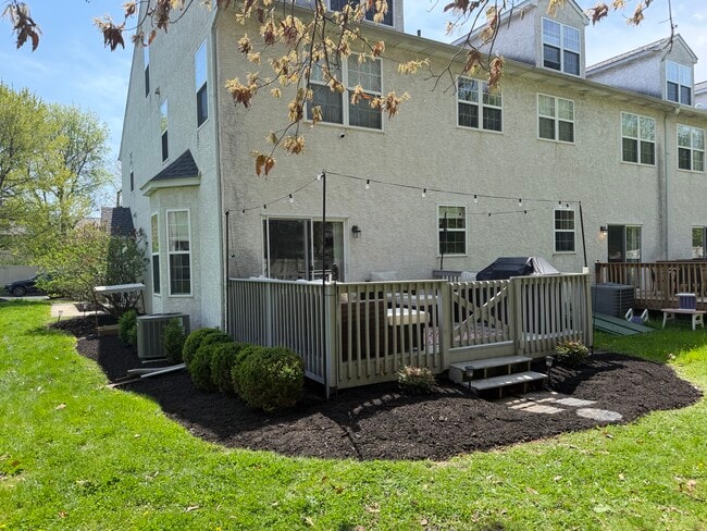 Back deck, string lights included for patio enjoyment - 270 Bella Ln