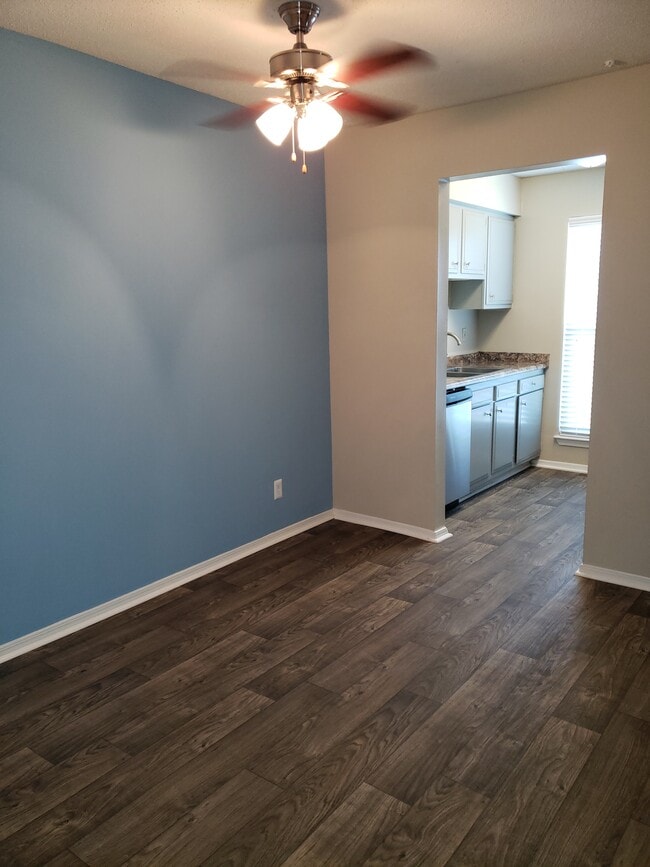 Dining room with accent wall - Spanish Oaks