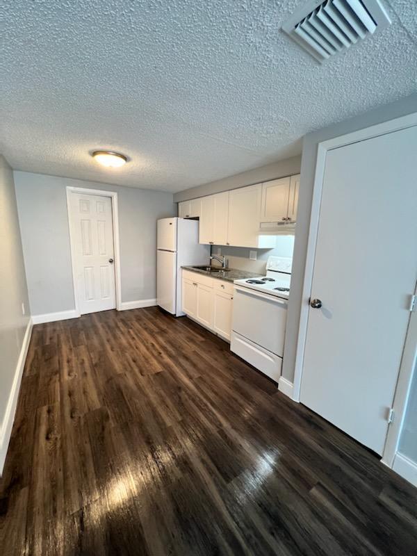 Building Photo - 1011 34th Ave W Unit A Rental