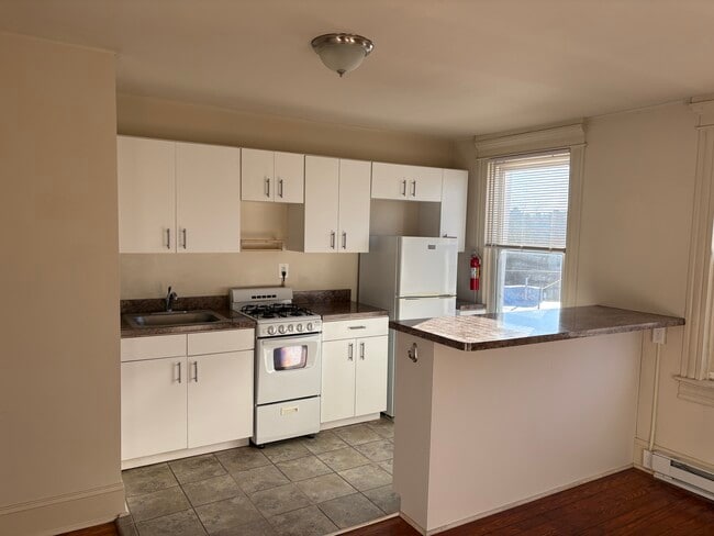 Building Photo - 2836 Guilford Ave Unit 3