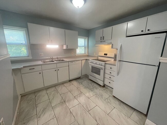 Building Photo - 24 S John St Unit Front