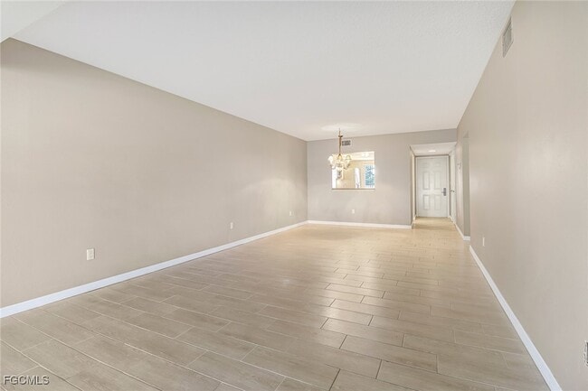 Building Photo - 7430 Lake Breeze Dr Unit 206