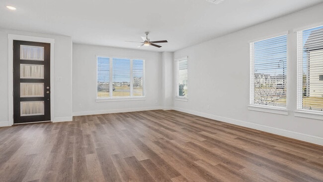 Living Room with Hard Surface Flooring - The Louise Townhomes