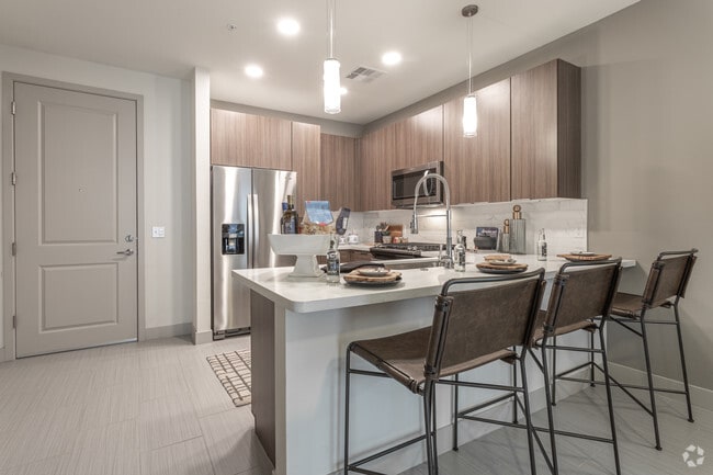 1BR, 1BA - A2 - 638 SF - Aura Watermark
