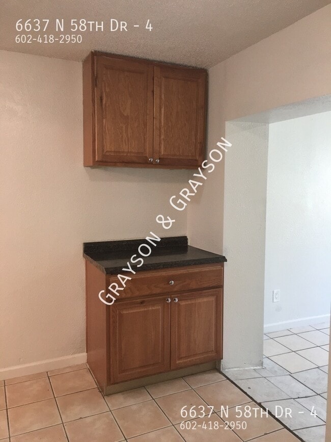 Photo - 6637 N 58th Dr Unidad 4