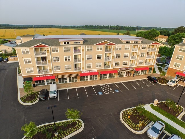 Building Photo - The Promenade at Red Apple Town Center
