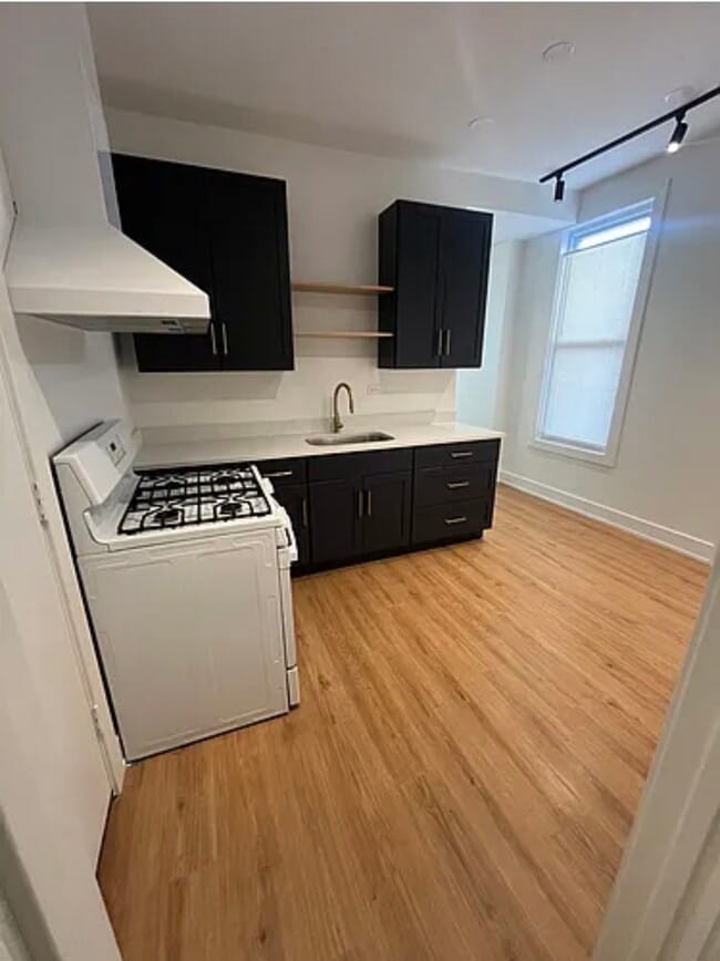 Photo - 2826 W 21st Pl Unit 2 Rear