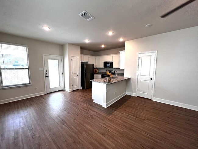Photo - Move Fast! Gated Townhome Near Lackland AFB with Private Yard & EV-Ready Garage
