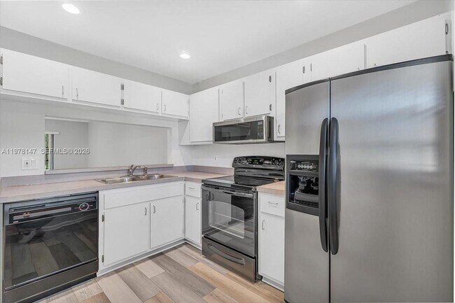 Photo - 6832 Palmetto Cir S Unit 201