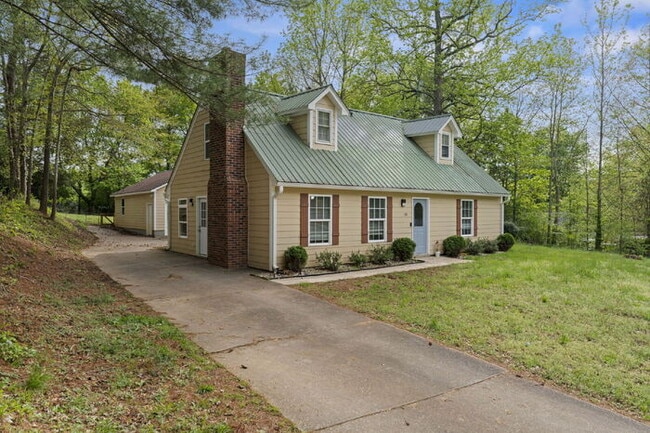 Photo - 4BR/2BA Piedmont Home with Flexible Layout + Detached Garage