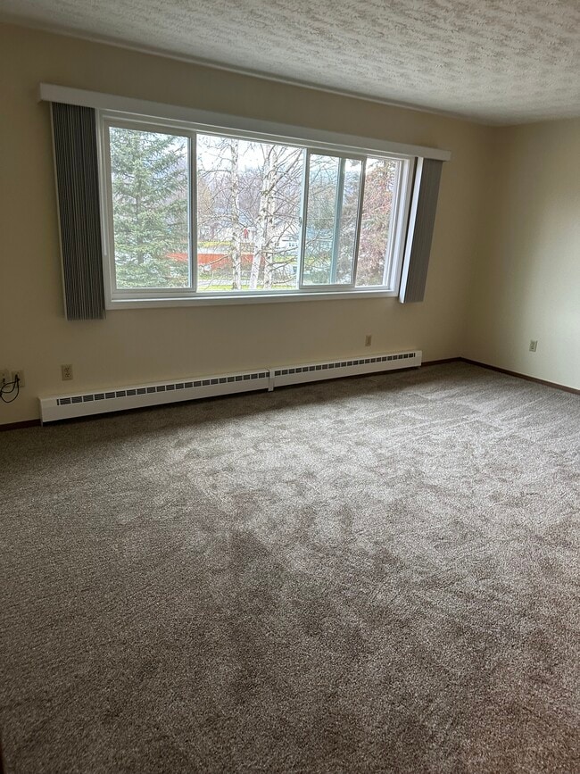 Building Photo - 6511 E 8th Ave Unit #4