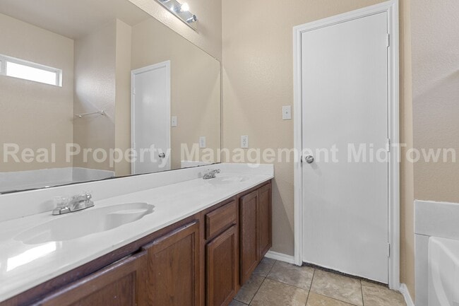 Photo - Charming 3-Bed, 3-Bath Home with Fireplace...