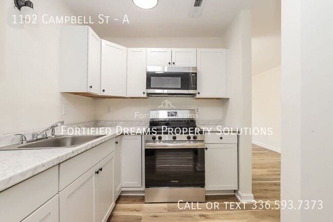Building Photo - 1102 Campbell St Unit A
