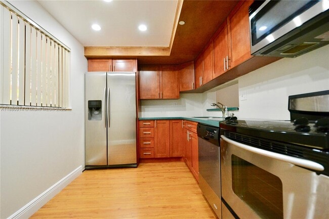 Building Photo - 8700 SW 133rd Avenue Rd Unit 315 Rental