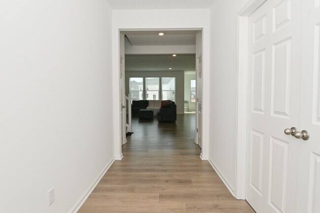 Photo - "Spacious 5-Bedroom Retreat with Luxurious Quartz Countertops & Fireplace on Deerberg Drive!"