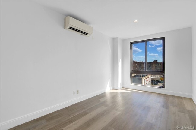 Building Photo - 4516 83rd St Unit E7B Rental