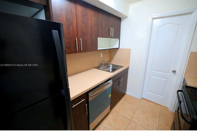 Building Photo - 13 S Royal Poinciana Blvd Unit 7