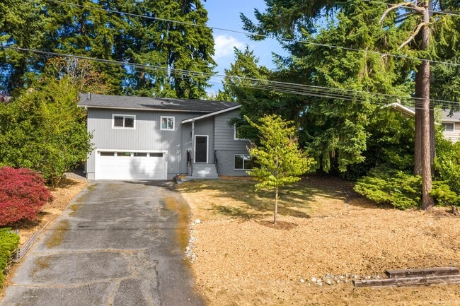 Photo - Updated Split-Level Home with Flexible Living Spaces & Backyard Deck