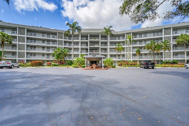 Building Photo - 4020 W Palm Aire Dr Unit 503