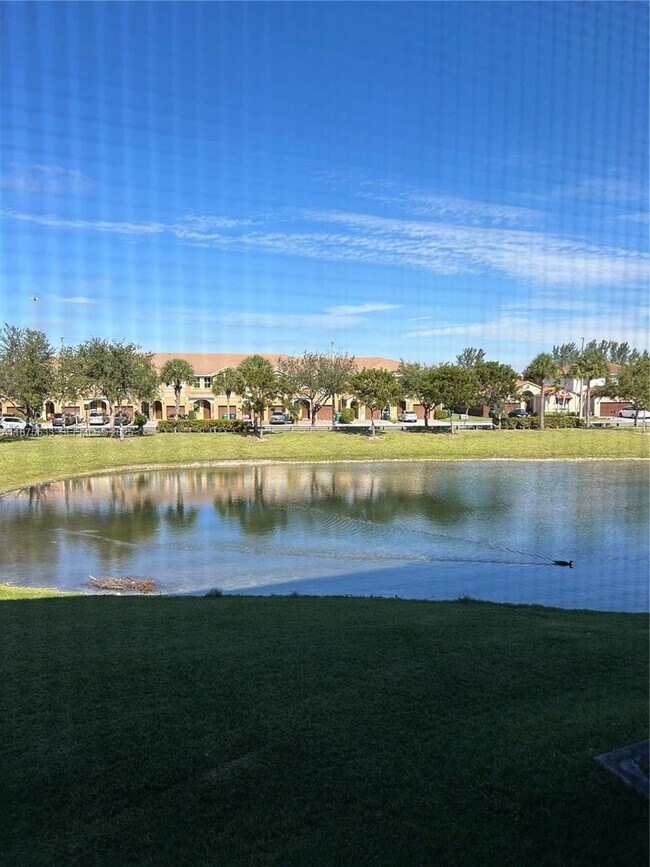 Building Photo - 10255 NW 9th St Cir Unit 205-7