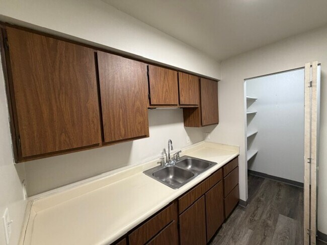 Photo - MOVE-IN Ready - 2 bedroom, One Bath - Top Floor with Private balcony and Central A/C! Unit 30