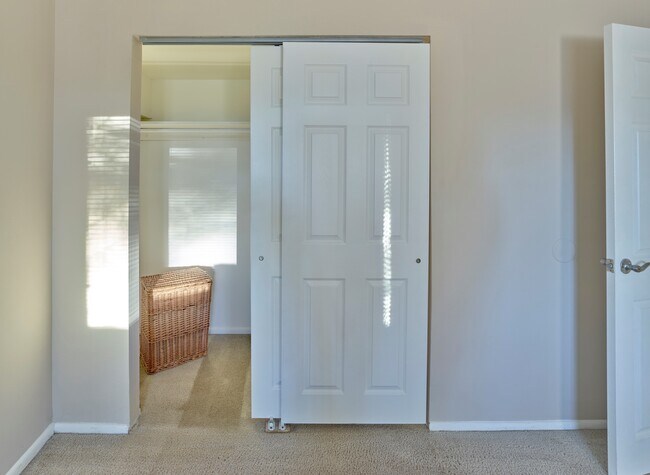 Enjoy ample closet space with sliding doors and built-in shelving at Haynes Run Apartments in Medford, NJ.