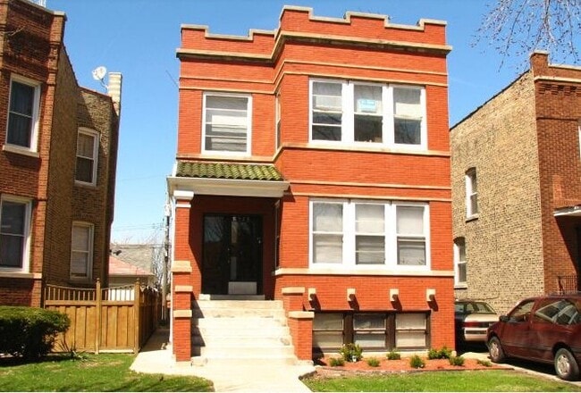 Building Photo - 4928 W Barry Ave Unit #1