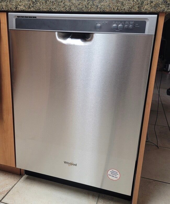 Kitchen - Stainless Whirlpool Dishwasher - 1080 Park Blvd Unit 603
