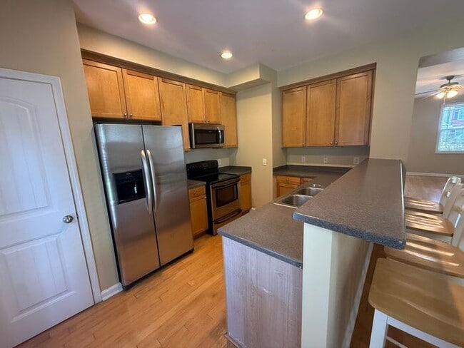 Photo - Spacious 3 bedroom 2.5 bath end unit townhome!