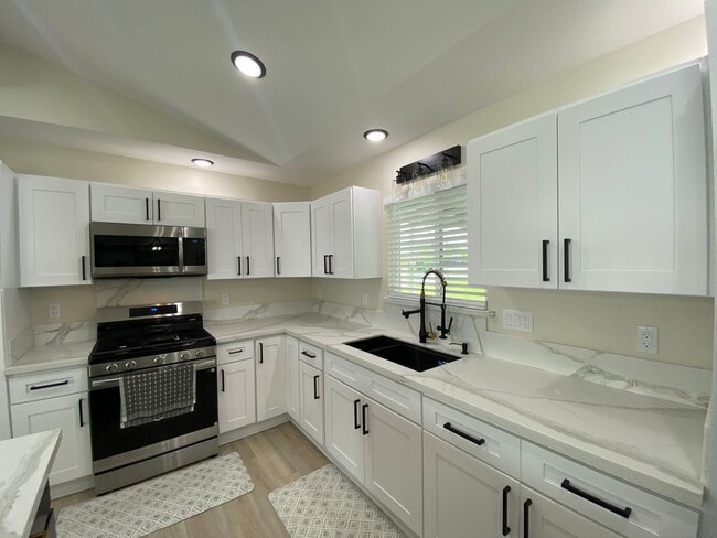 Photo - Move-In Ready 3-Bed, 2-Bath Home in Ainaloa – AC, Garage & Wi-Fi Included