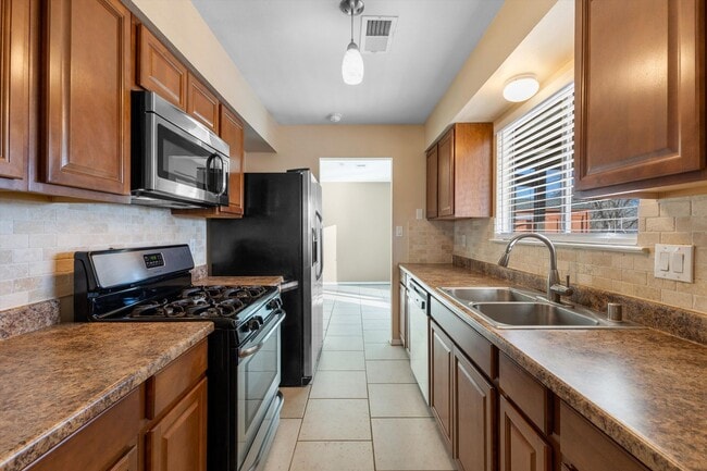 Photo - House For Rent | 3-Bed 2-Bath | 2-Car Garage | Rio Rancho SE | Large Backyard