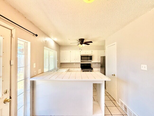Photo - "Charming 3-Bedroom Home with 2 Full Baths in Lubbock's Heart – 1277 Sq Ft of Comfort Await!"