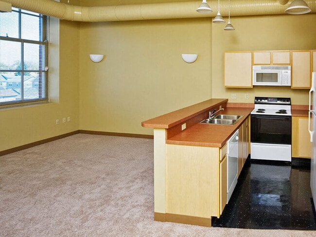 High Ceilings and Expansive Windows - The Brick Lofts at Historic West Tech