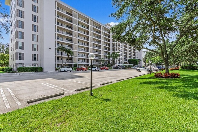 Building Photo - 3250 N Palm Aire Dr Unit 406