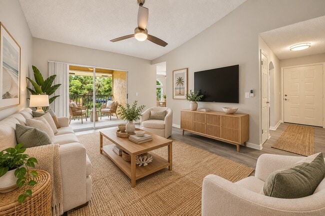 Step into comfort at Indian Hills, where cozy design meets modern living. This inviting living room features a seamless blend of natural light and stylish decor, perfect for relaxation. Explore your new home today!